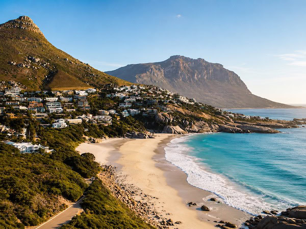Coastal Beach Beneath Mountain Homes